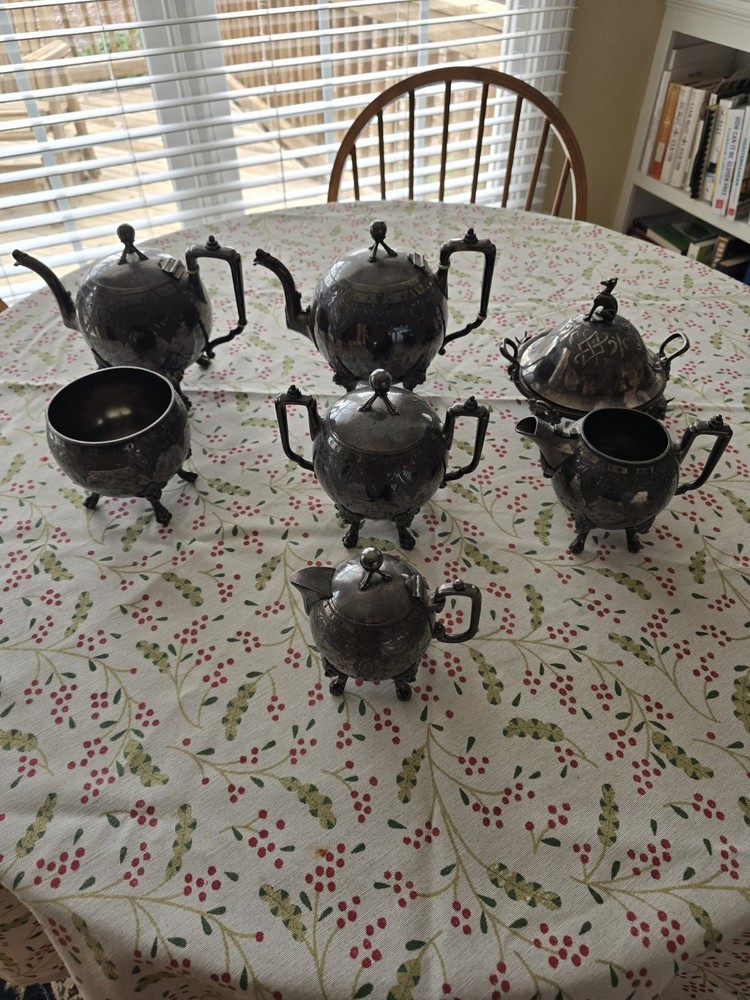 Seven Piece Antique Figural Clawfoot Silver Plate Tea Set