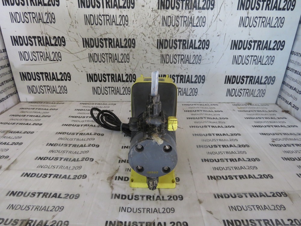 LMI DOSING PUMP AA151-498SI USED