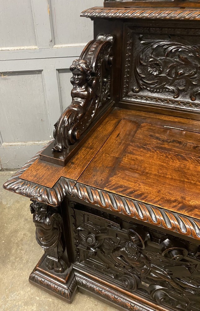 CARVED FIGURAL WALNUT BENCH