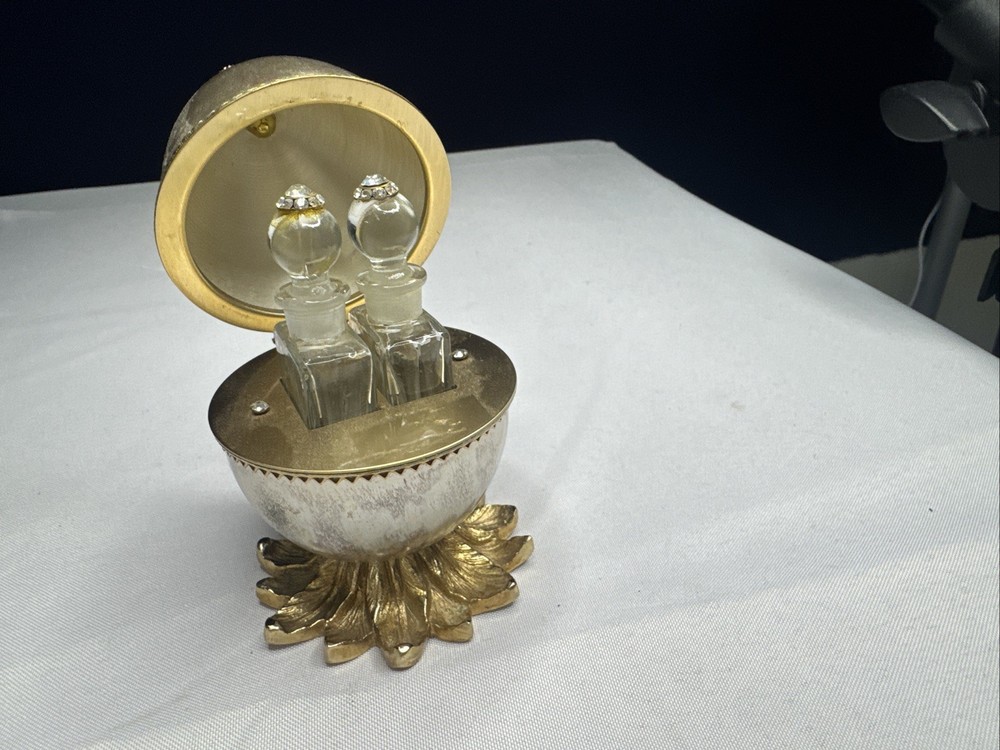 Evans MCM Perfume Egg With Rhinestones