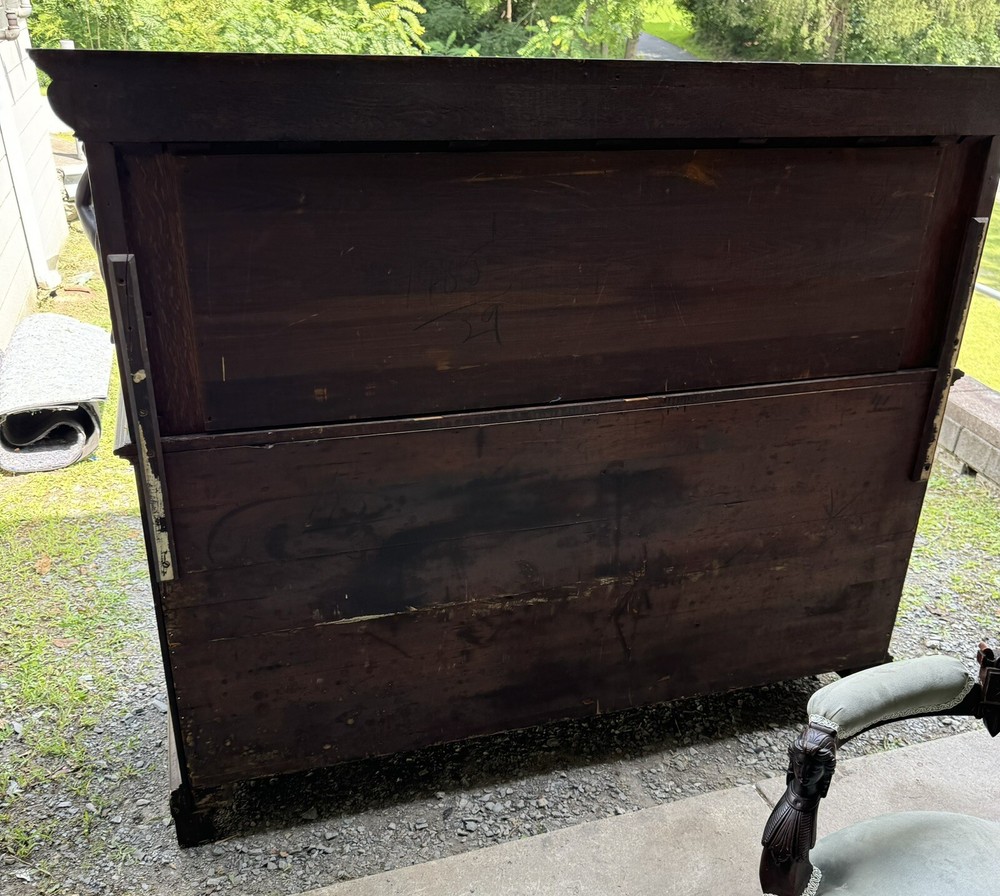 A. J. JOHNSON CARVED FIGURAL OAK SIDEBOARD