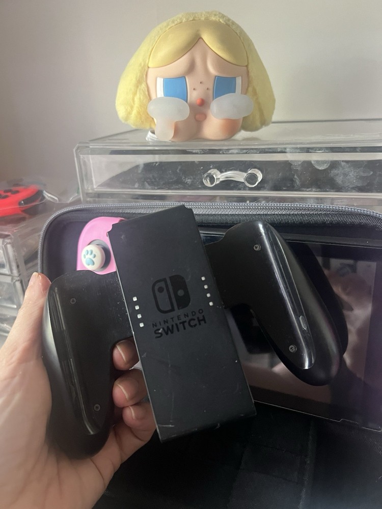 Nintendo Switch Console w/ Joy-Con, Grip, tomtoc Case, Thumb Grips