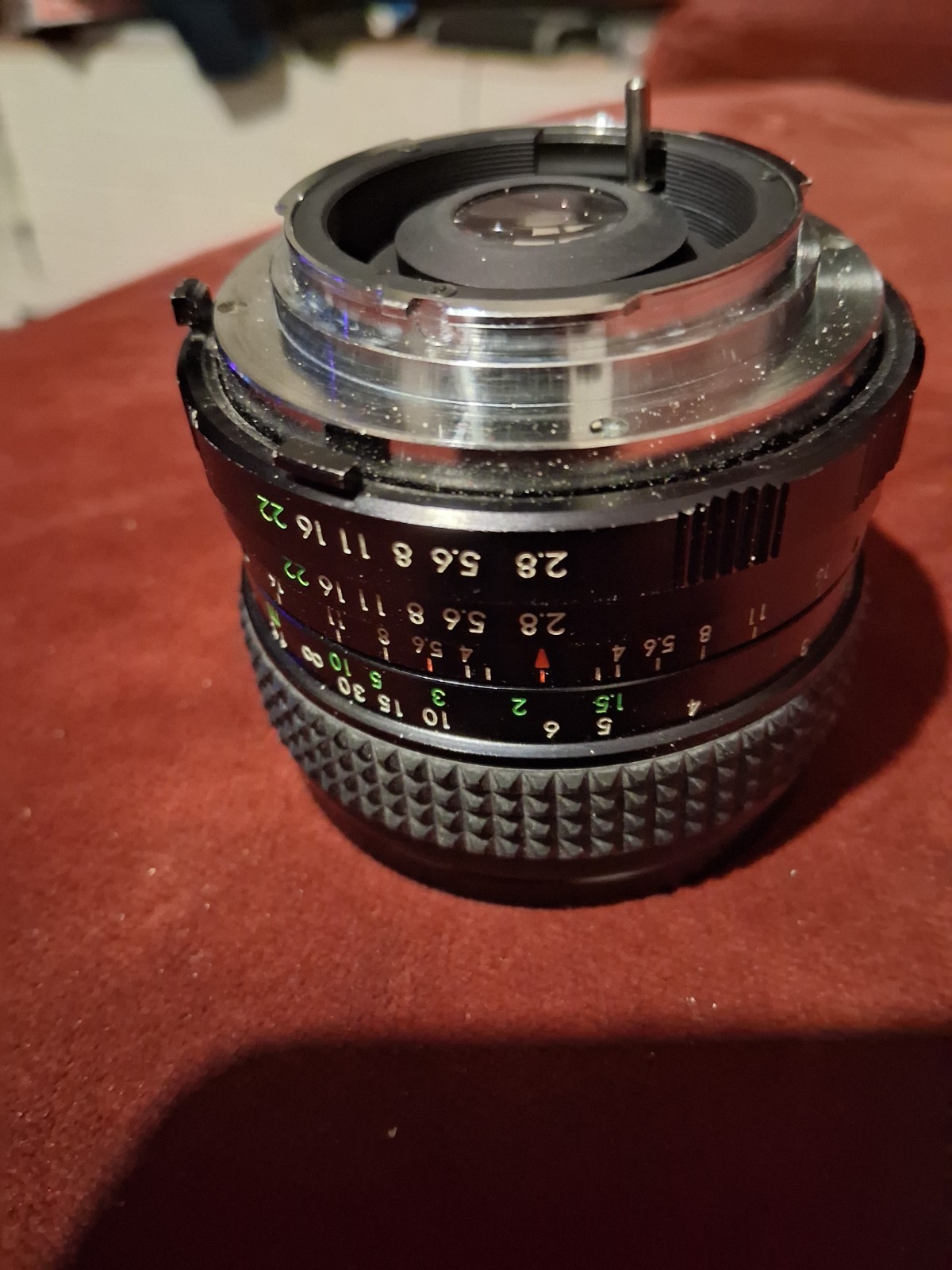 Minolta X-700 35mm film camera with two lenses and a camera case.