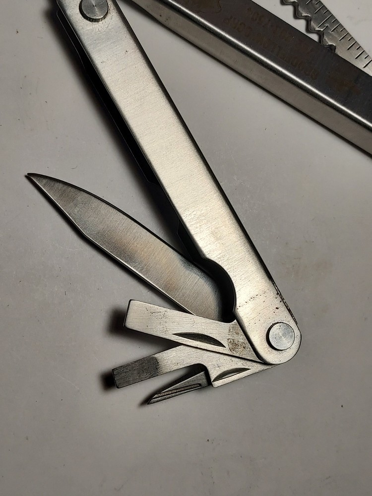 Multi Tool + Nylon Pouch advertising Goodfellow Corp - Pliers, Blade