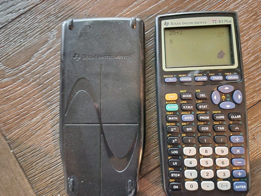 Texas Instruments TI-83 Graphing Calculator With Cover - Tested Working