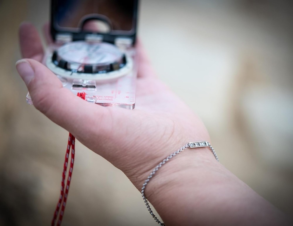 Portable Navigation Compass with Declination Adjustment and Clinometer Features