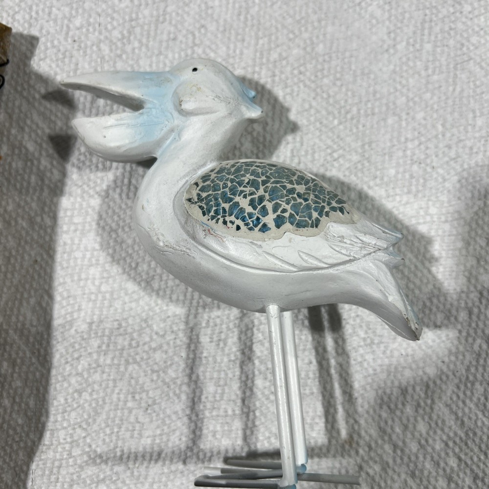 Pelican Wind Chimes & Statues