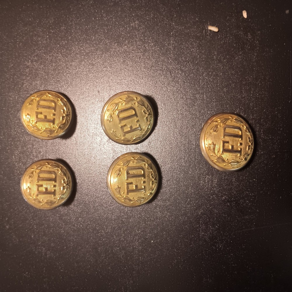 Fire department brass uniform buttons