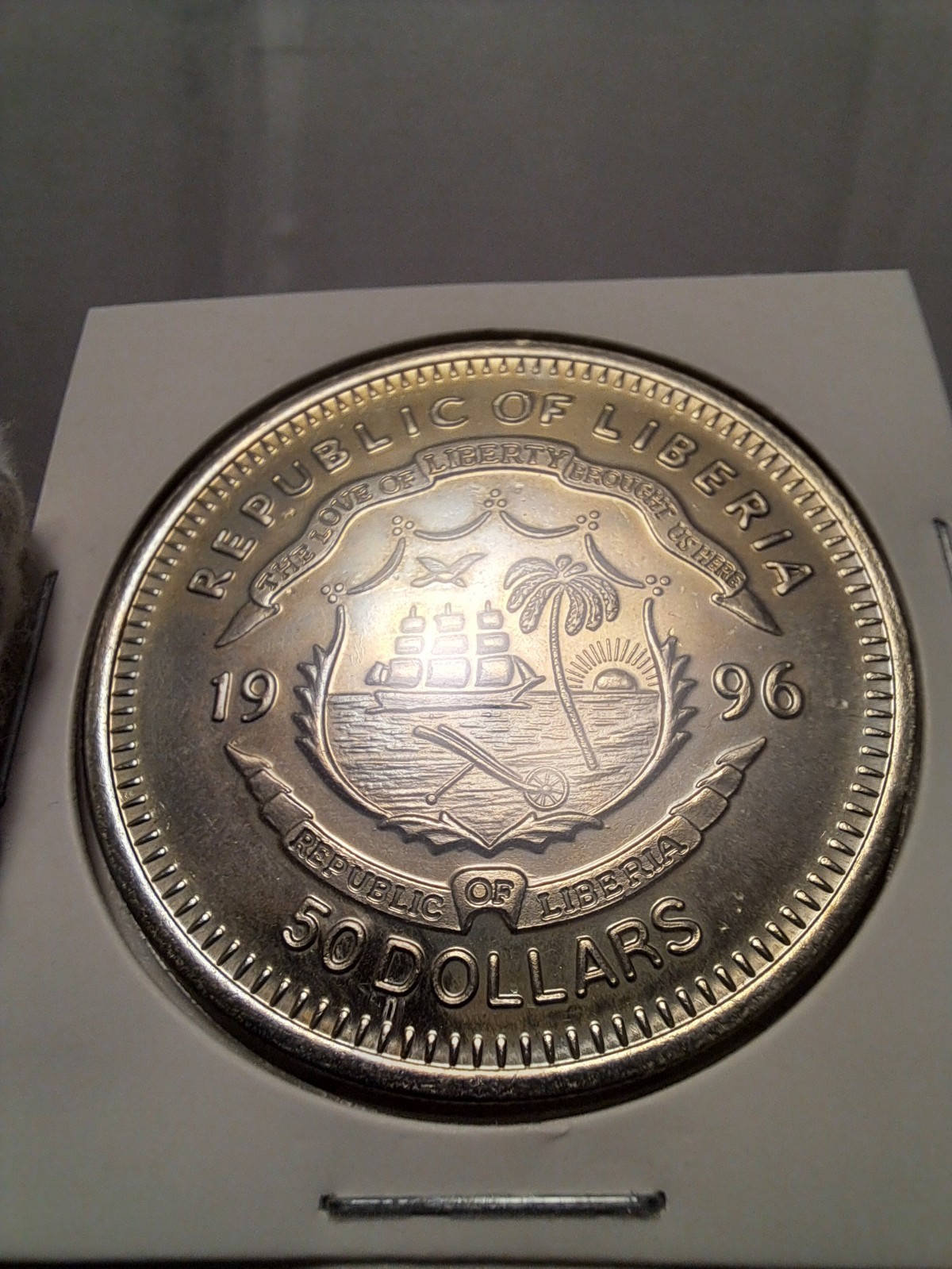 1996 Liberia 50 Dollar Coin | Uncirculated | Light Toning