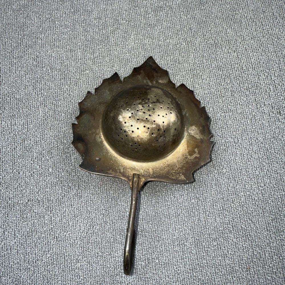 Vintage Silver plated tea strainer maple leaf