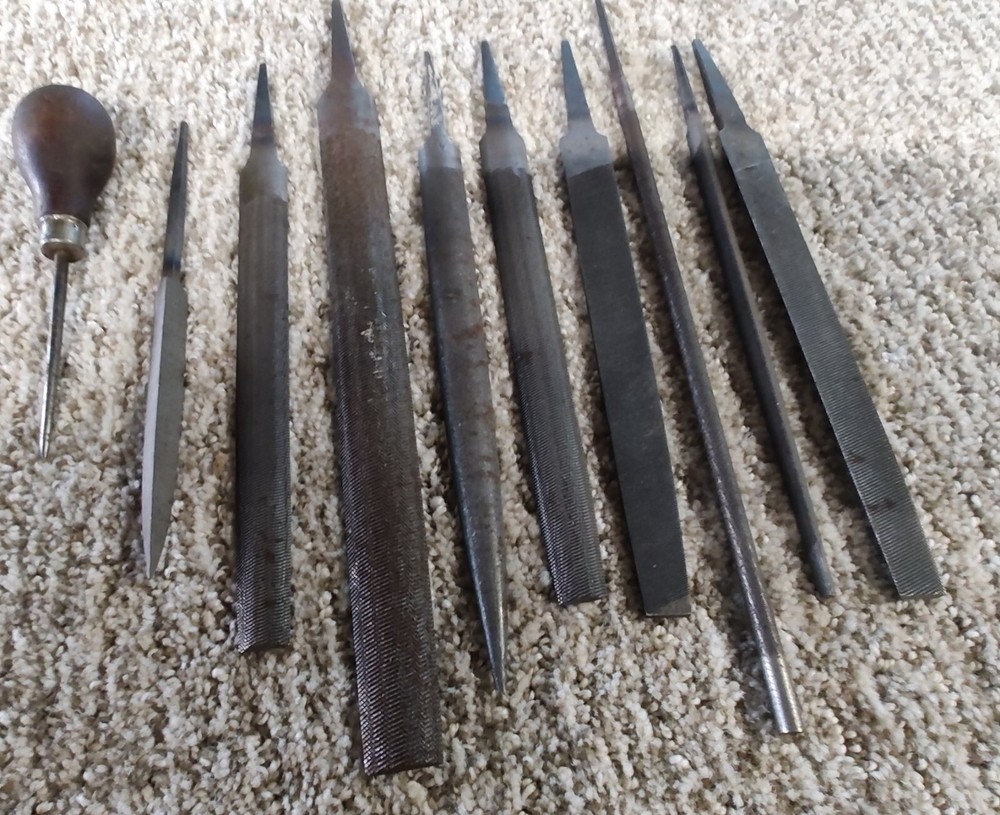 FILE SET WITH SCRAPER AND HANDLED PICK