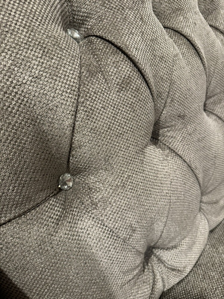 Light grey sofas/ couches.