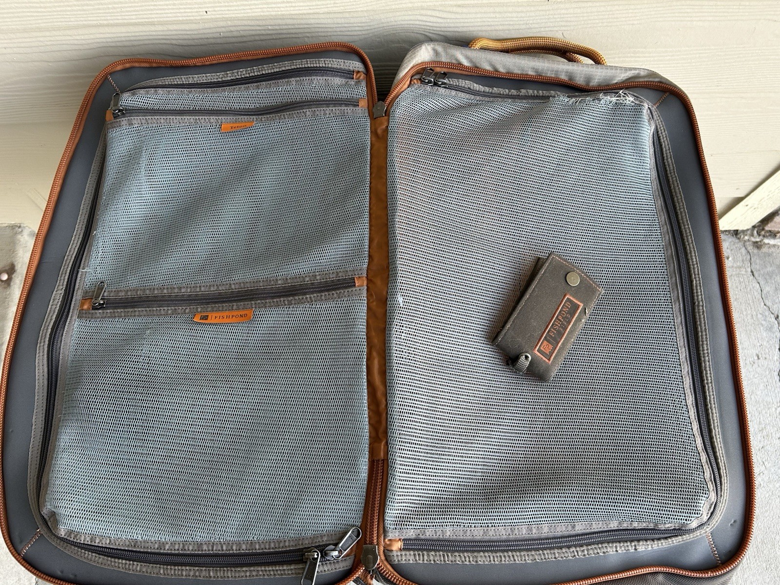 $279 FISHPOND "Teton" 22" Carry-on Wheeling Luggage Bag