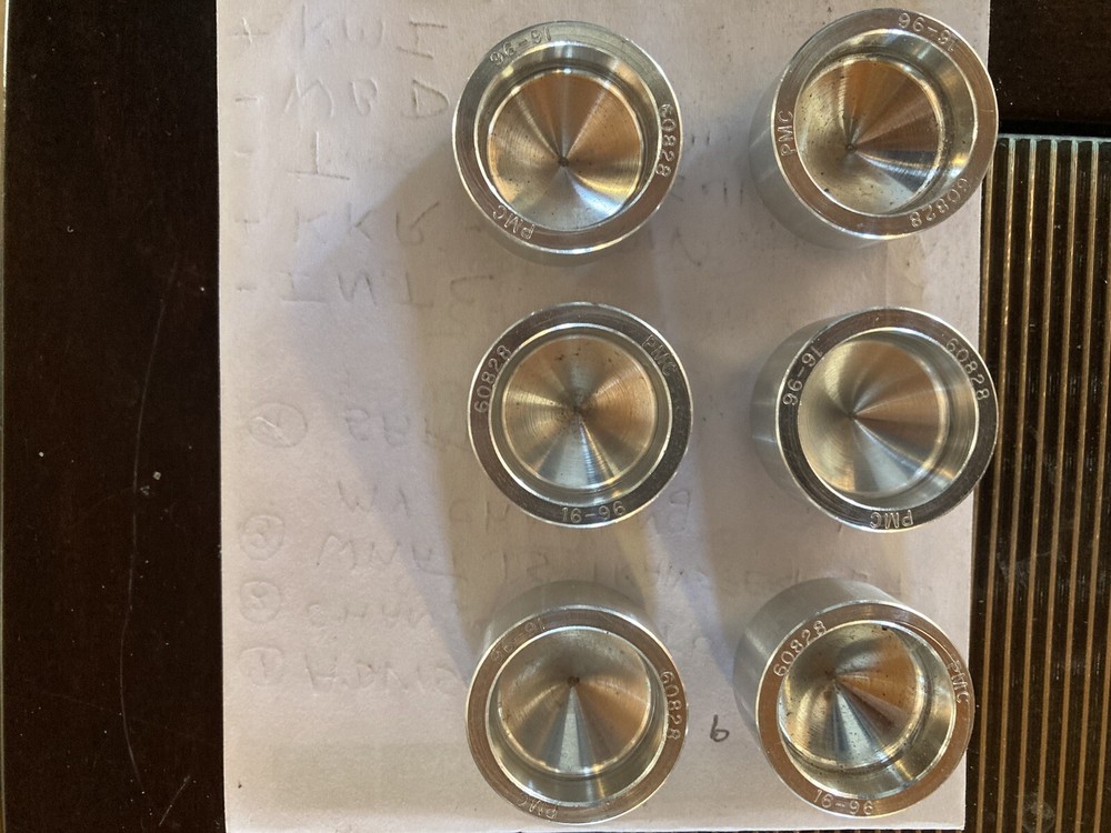 Piston pin plugs