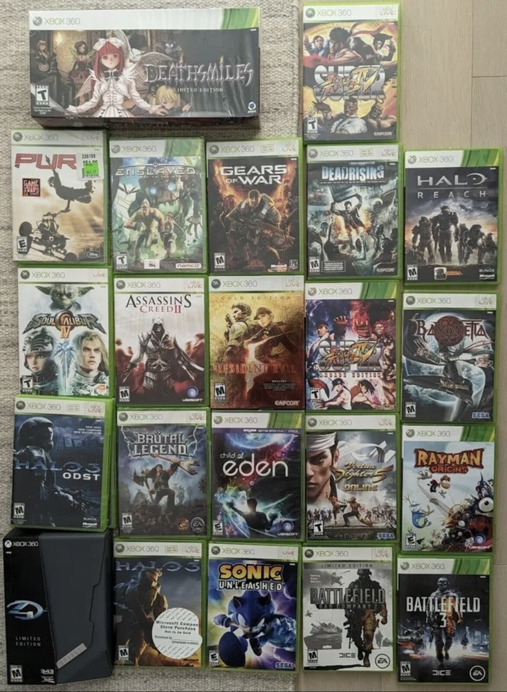 XBOX 360 Slim with 20 Games ,2 controllers, and kinect.