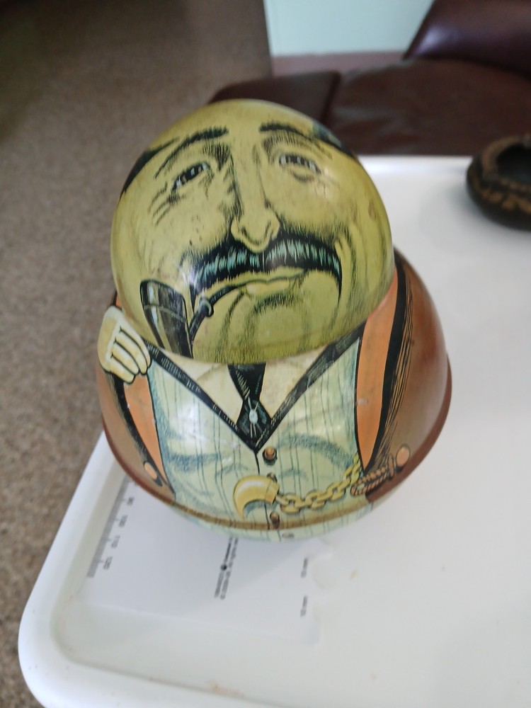 Tin Container Big Man With Pipe