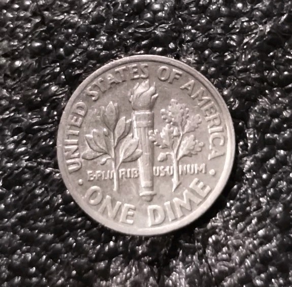 1989 P Mint. ERROR dime. Off Center Strike.