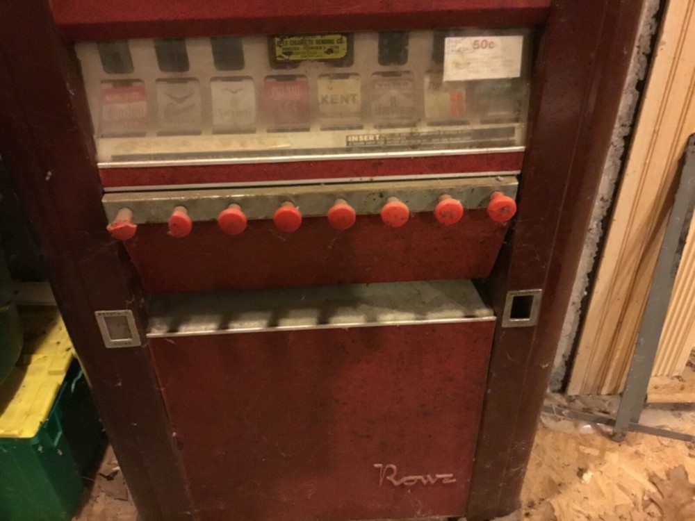 Antique cigarette machine