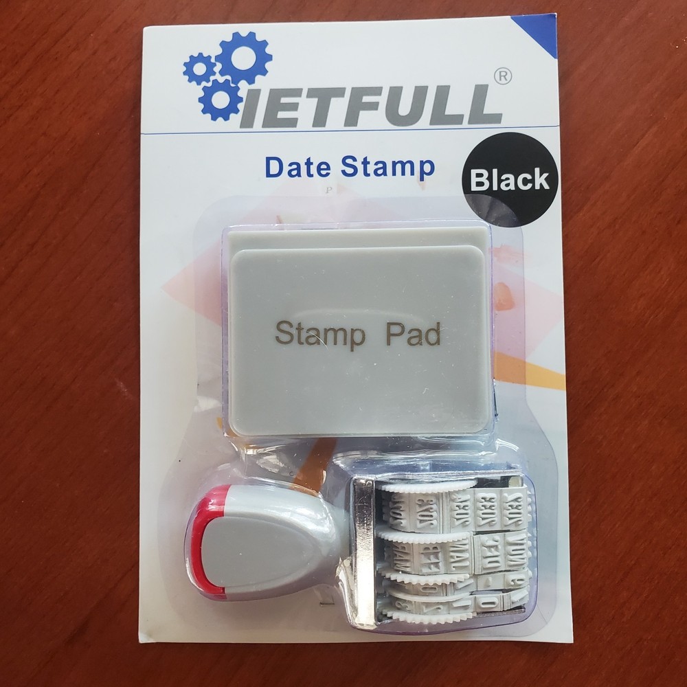 Customizable date stamp with black ink stamp pad