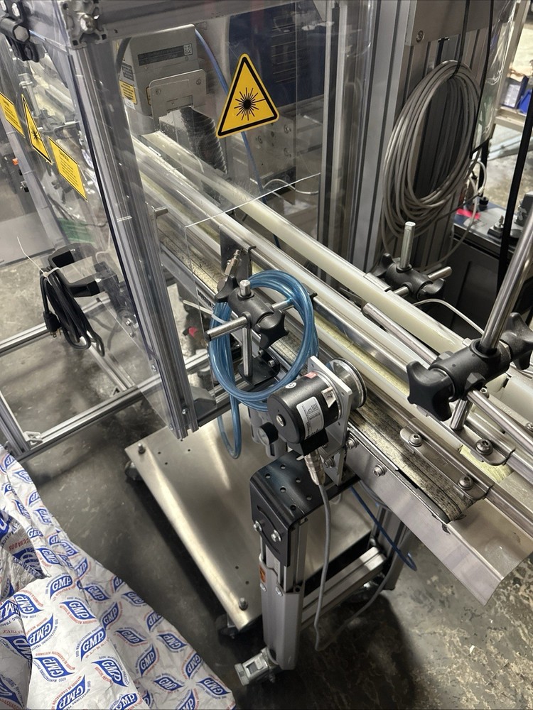 Domino Laser Module D320i w/ Cognex Inspection Conveyor System