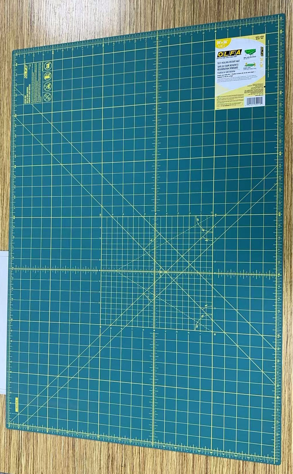 OLFA 24x36 Self Healing Rotary Cutting Mat with Grid and Double-Sided, Green