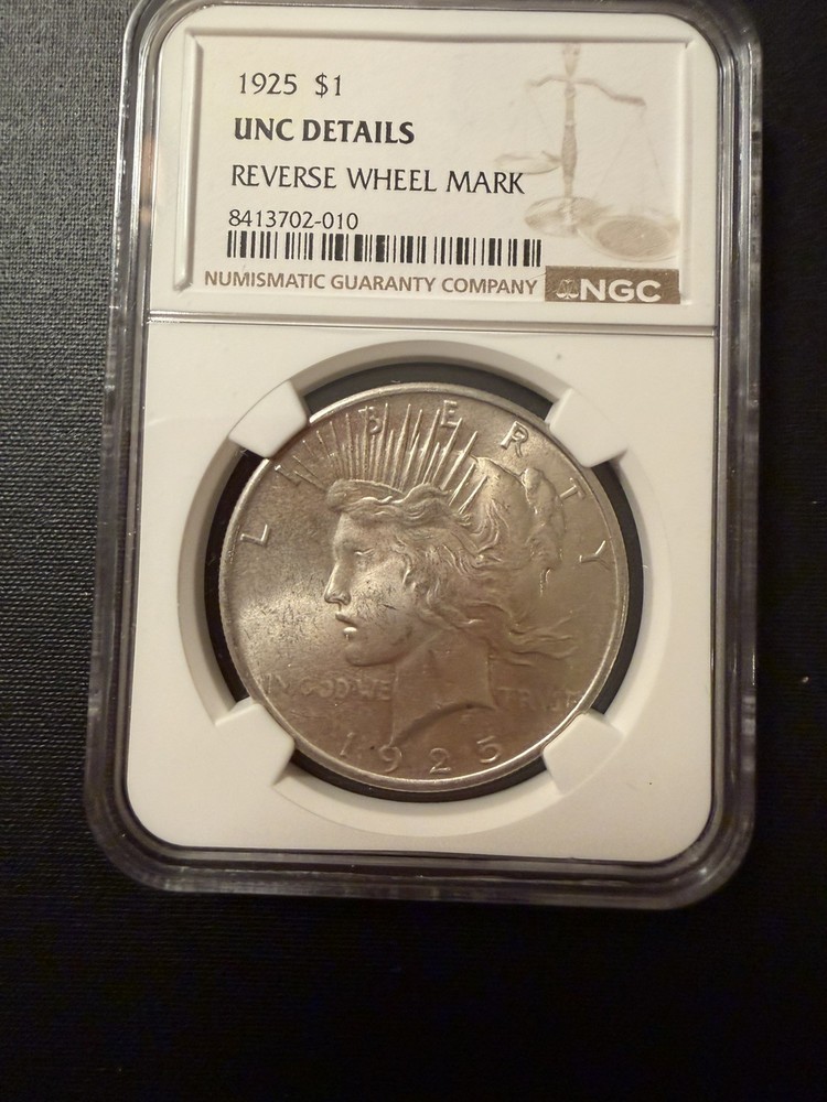 1925  Peace Silver Dollar NGC UNC Details - Reverse Wheel Mark