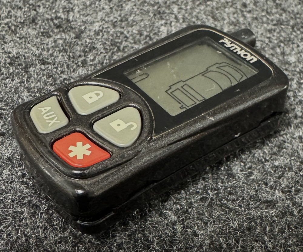 Python V/P/C EZSDEI478 Remote/USED/Case Clip Broke/Light Up/No Confirm on Trans