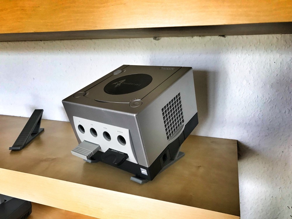 Universal game console stand display