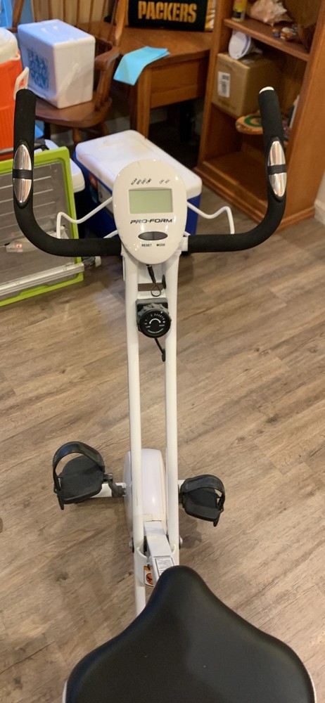 pro-form white foldable stationary exercise peddling bike