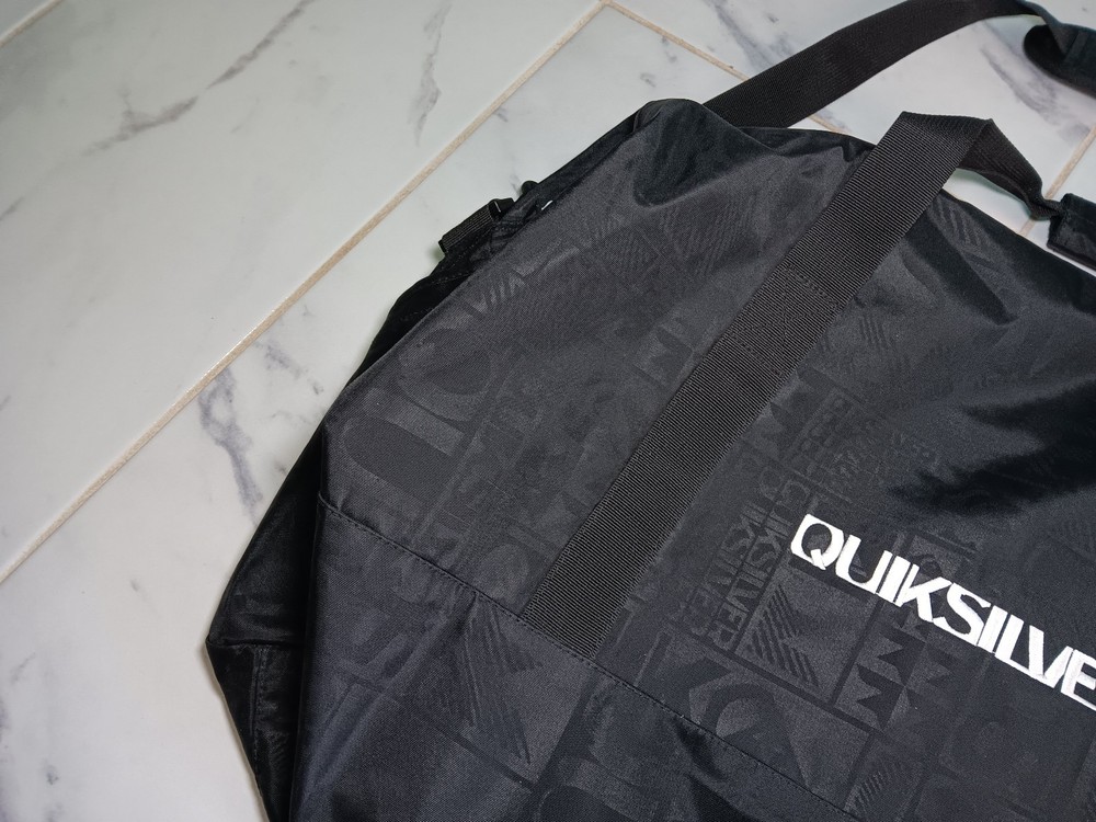 Quiksilver duffle black bag 100% polyester 27" long.