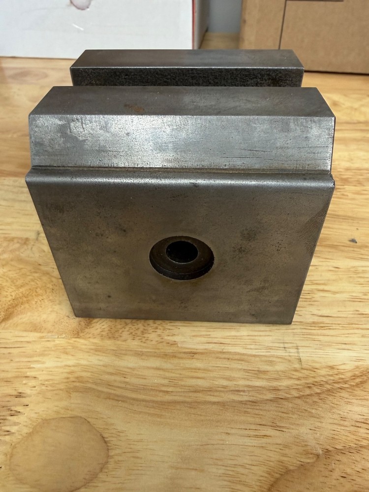 Slotted steel riser block