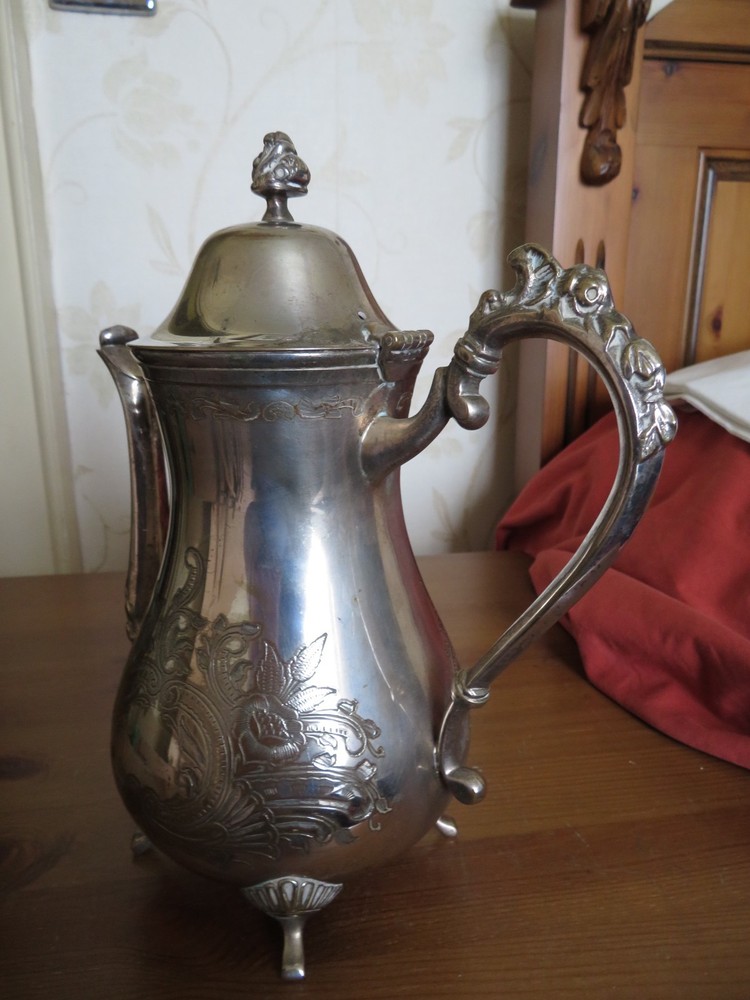 Vintage silver plated ornate coffee pot