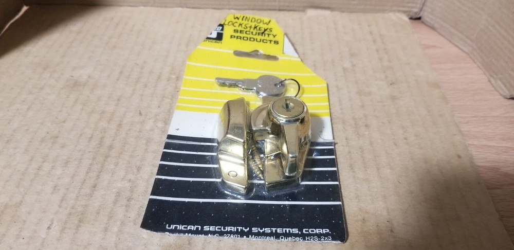 ilco Unican Security Products Brass Security Window Lock. NOS-Damaged packaging