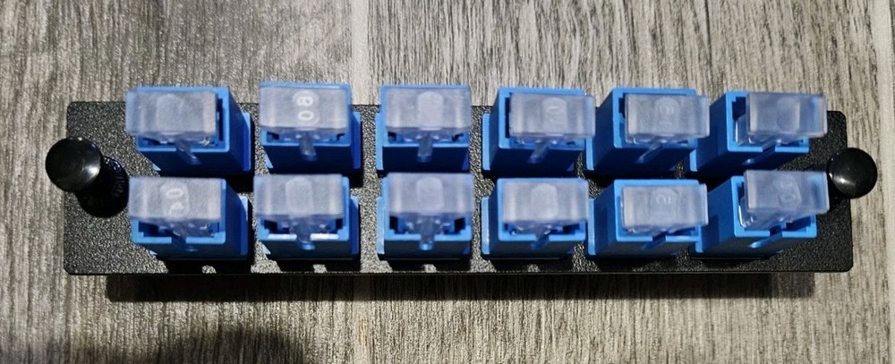 Loaded LGX Adapter Panel with 12x Simplex SC/UPC Singlemode - Black