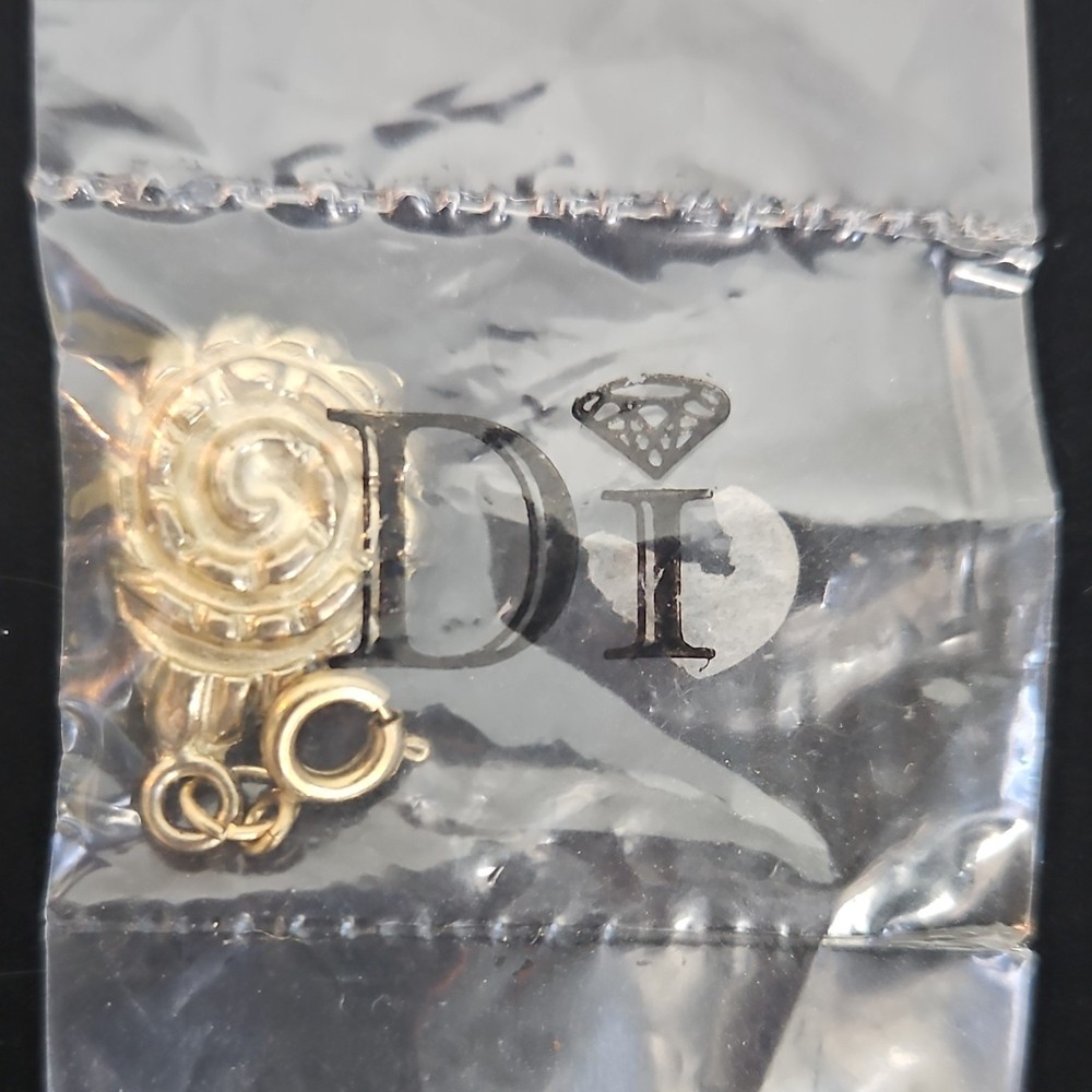 Diamond International Gold-Toned Metal Shell Dangle Charm