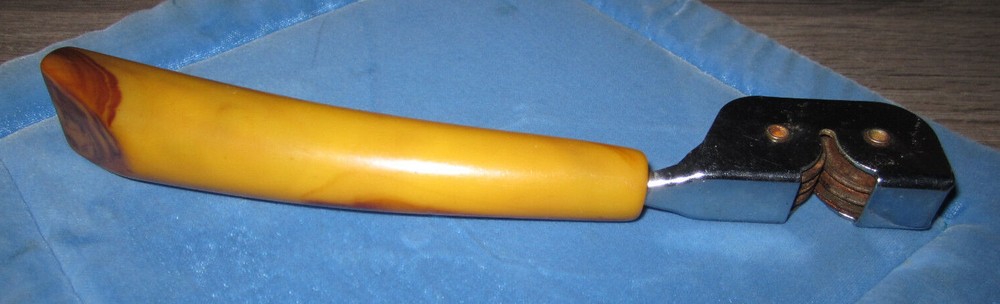 Vintage butterscotch Bakelite handle pull through knife sharpener