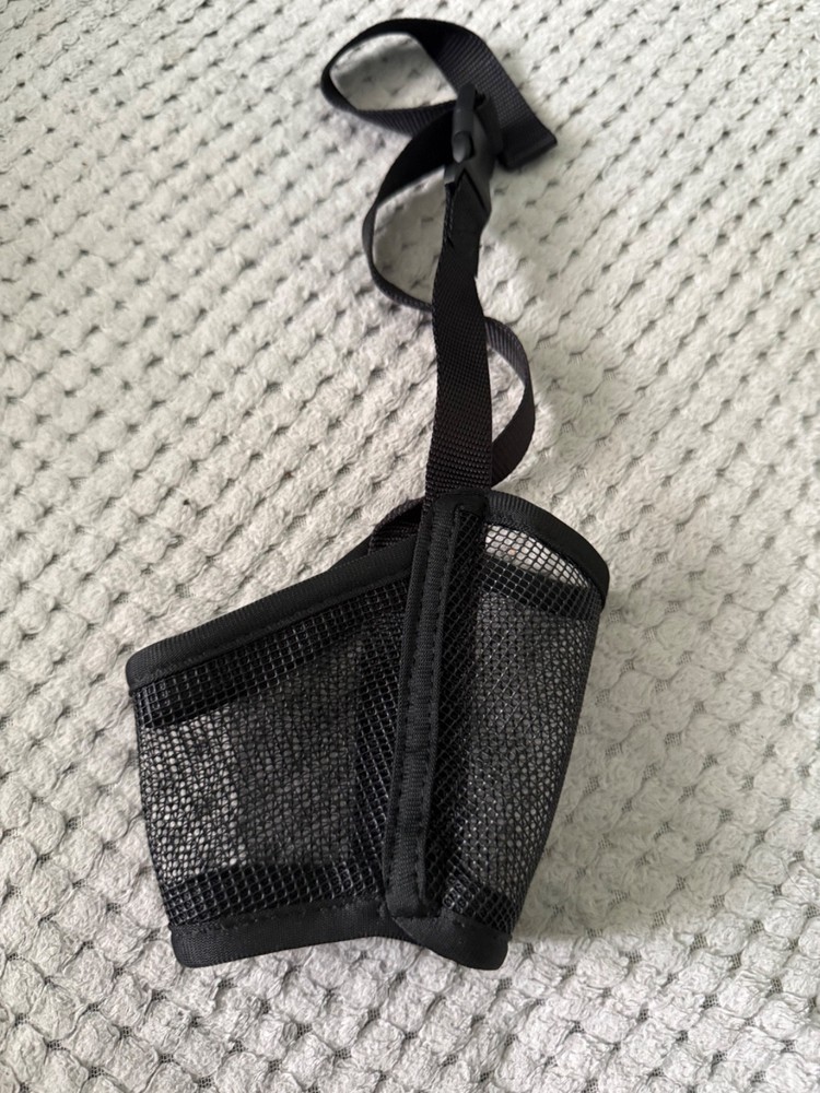"Adjustable Black Mesh Muzzle for Dogs - Breathable and Comfortable Training Aid