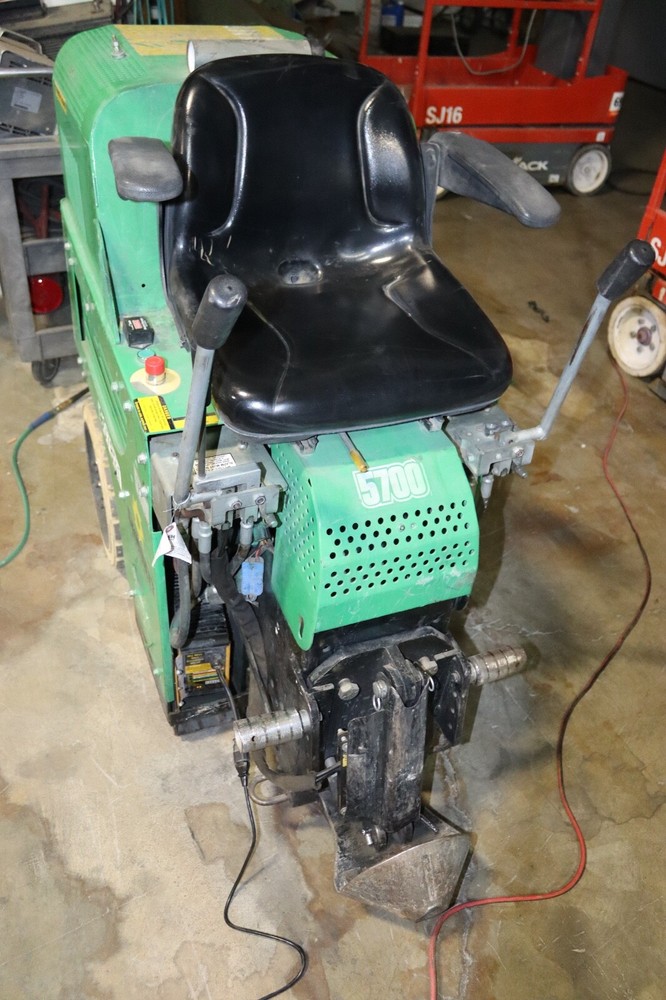 NATIONAL 5700 RIDE ON FLOOR SCRAPER WORKING