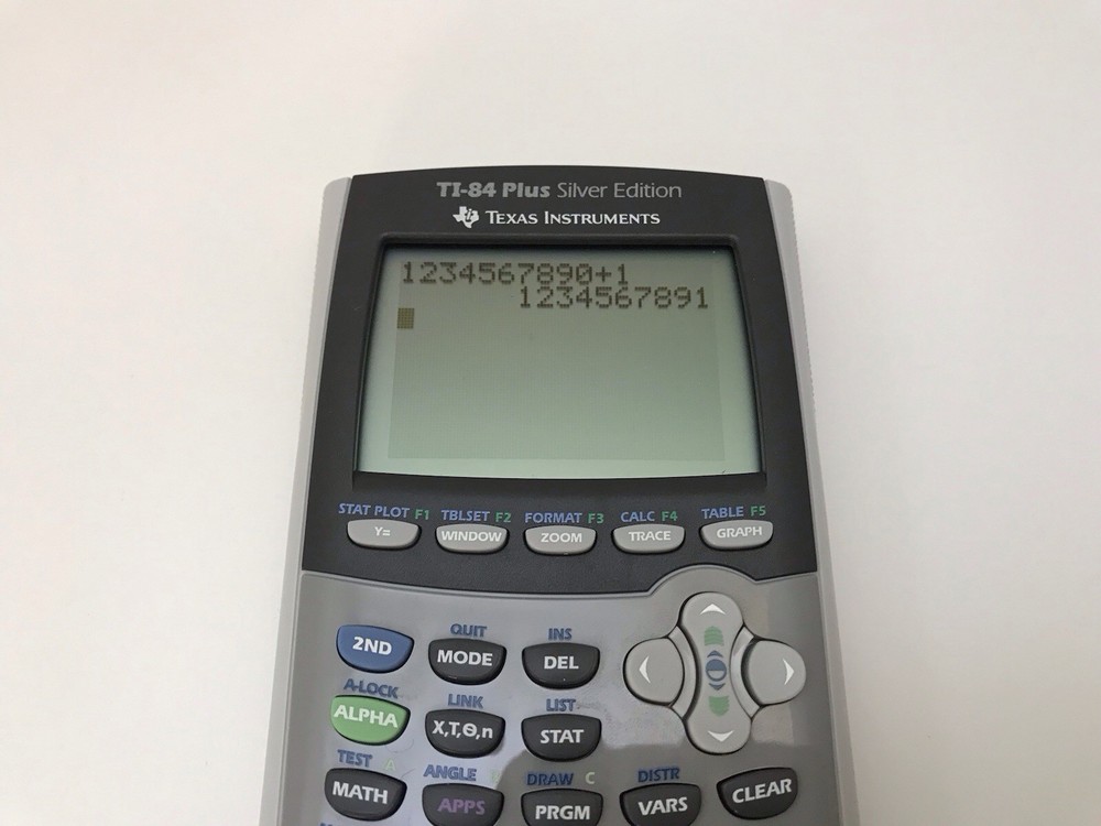 Texas Instruments Ti-84 Plus Silver Edition Graphing Calculator W/ Manual Cables