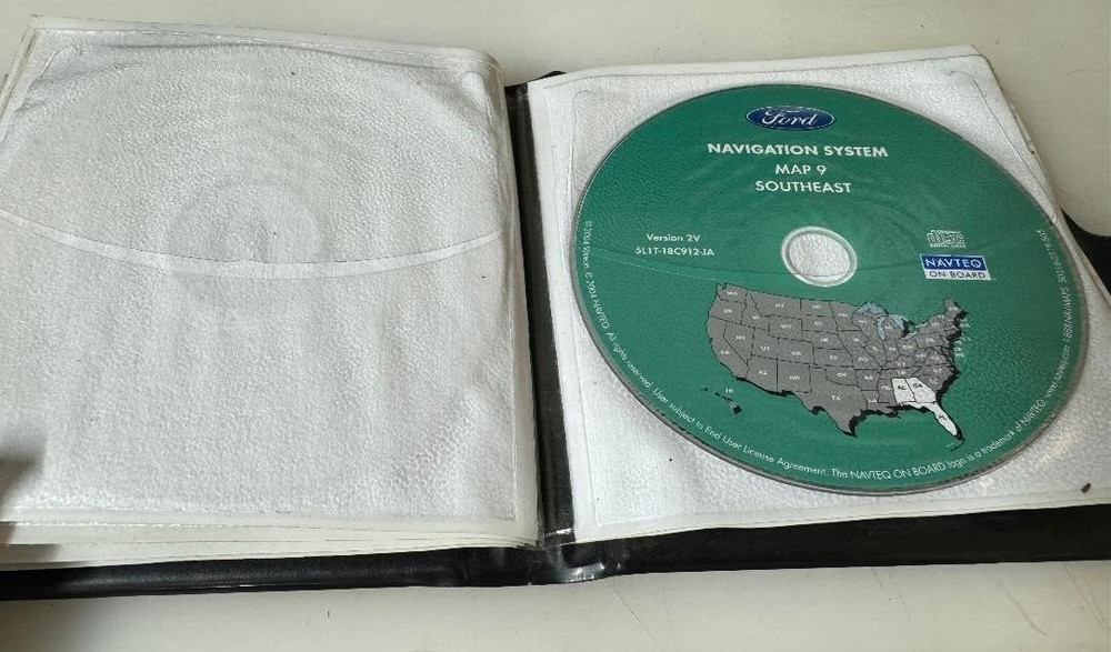 FORD P/N 5L1T-18C912-AA NAVIGATION SYSTEM DISCS ((MISSING 8)) UNTESTED CONDITION