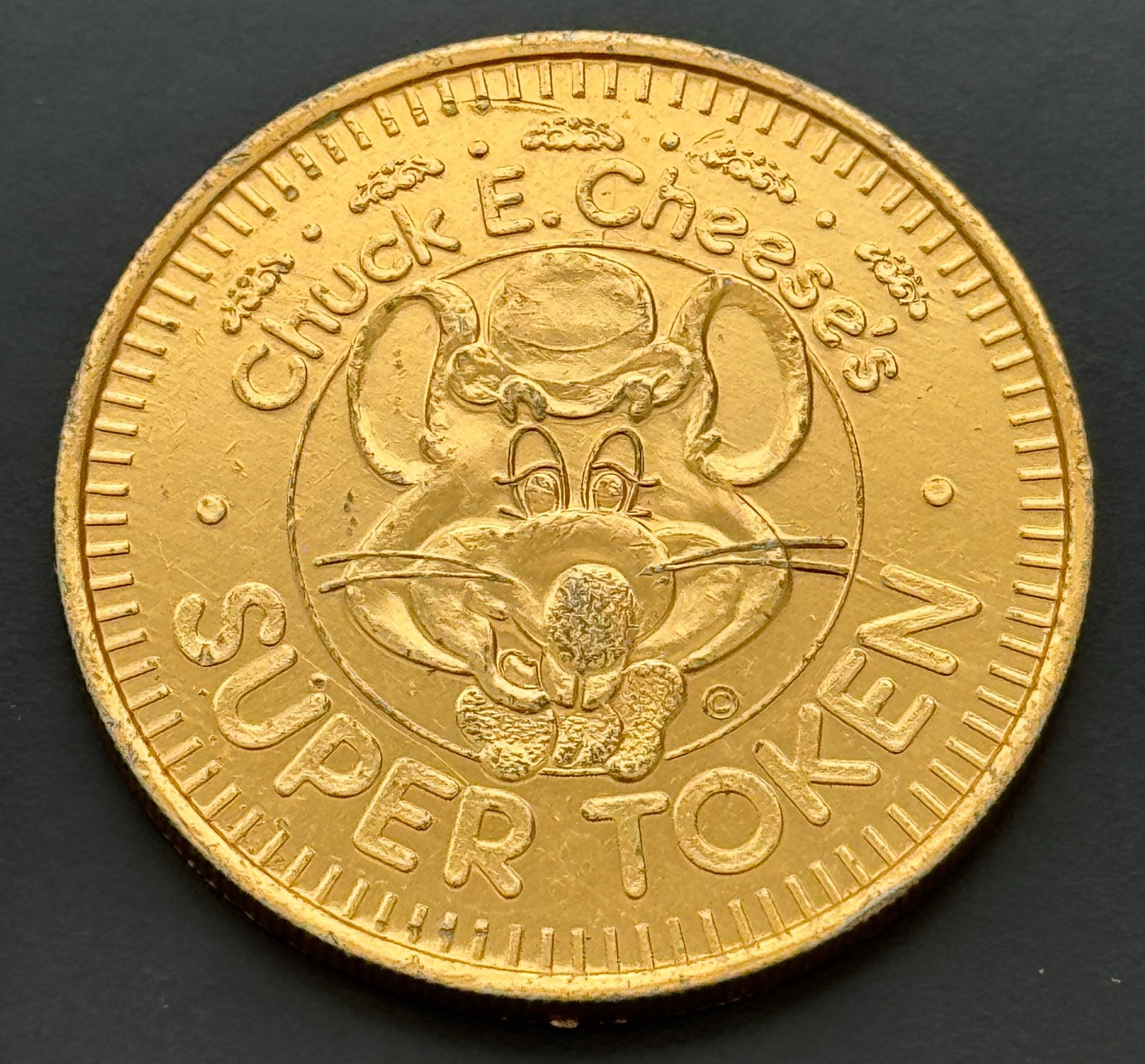 Chuck E Cheese Super Token Annodized Aluminum Chucky