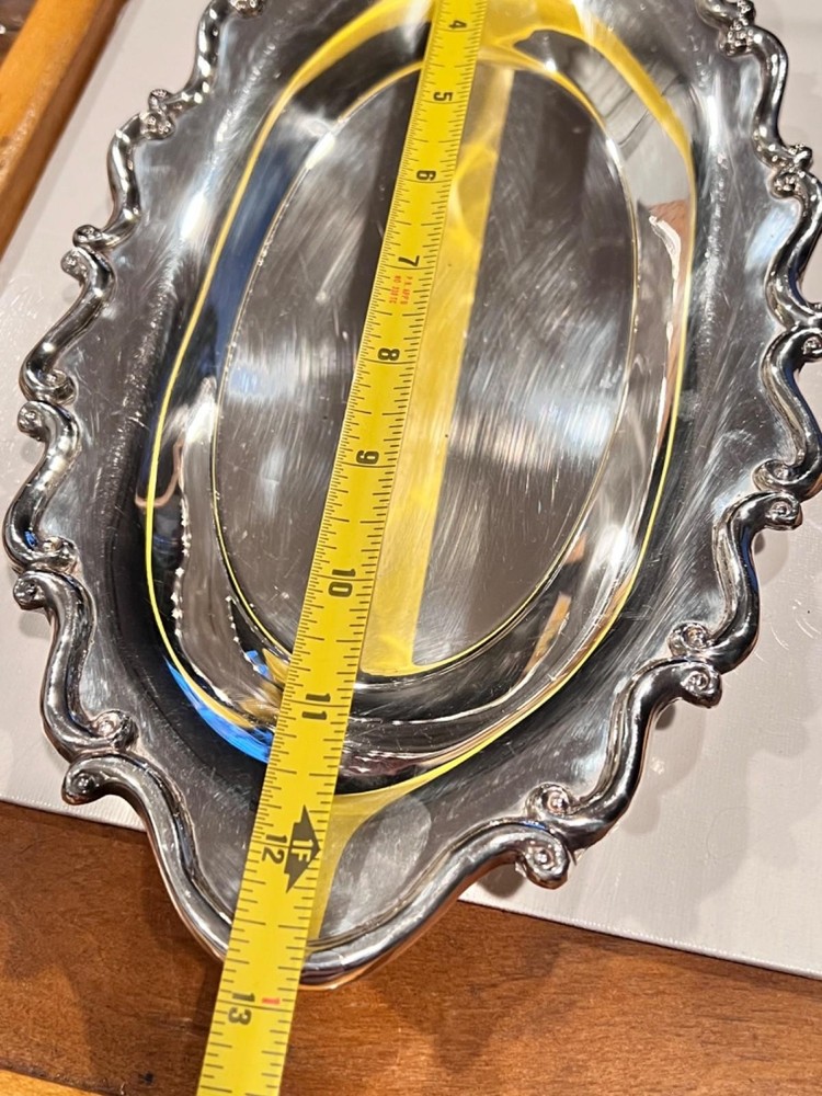 silver-plated seving tray with ornate border