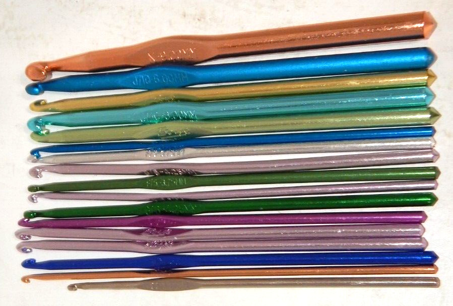 17 Assorted Crochet Hooks and Bag