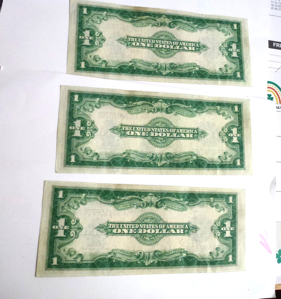 Three consecutive numbered Unc. 1923 $1.00 Large
