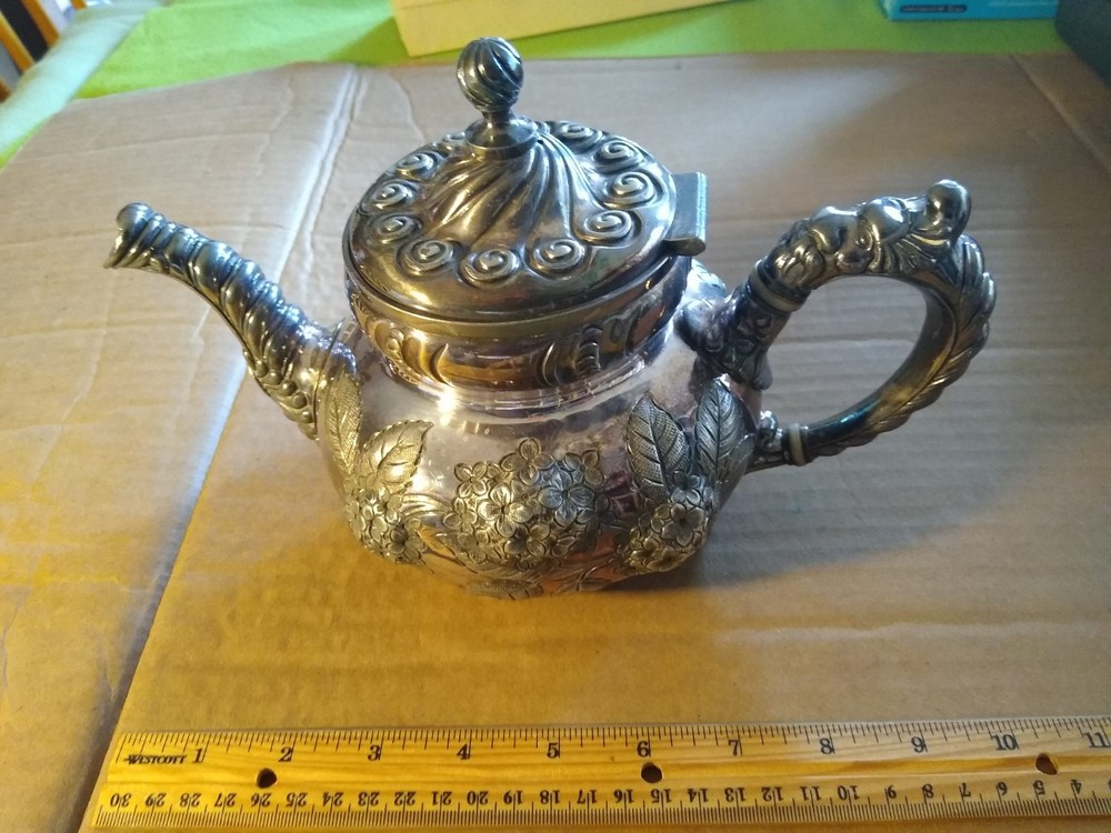 Vintage Rogers Smith & Co. quadruple Silver plated flower design Pitcher.