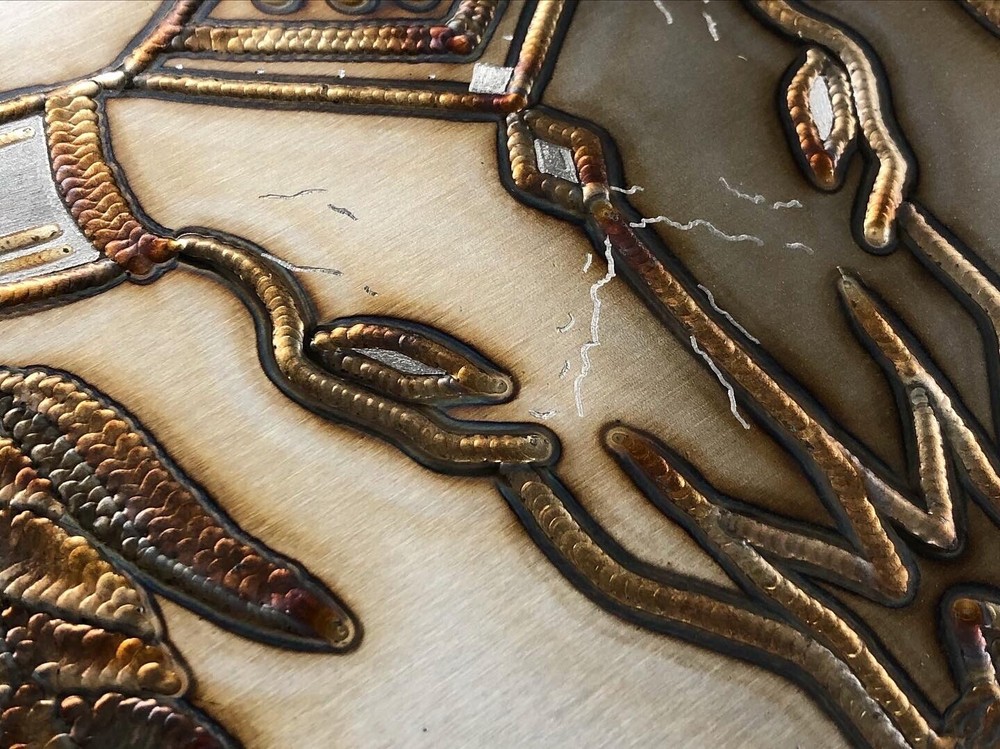 Western Cow Weld Art