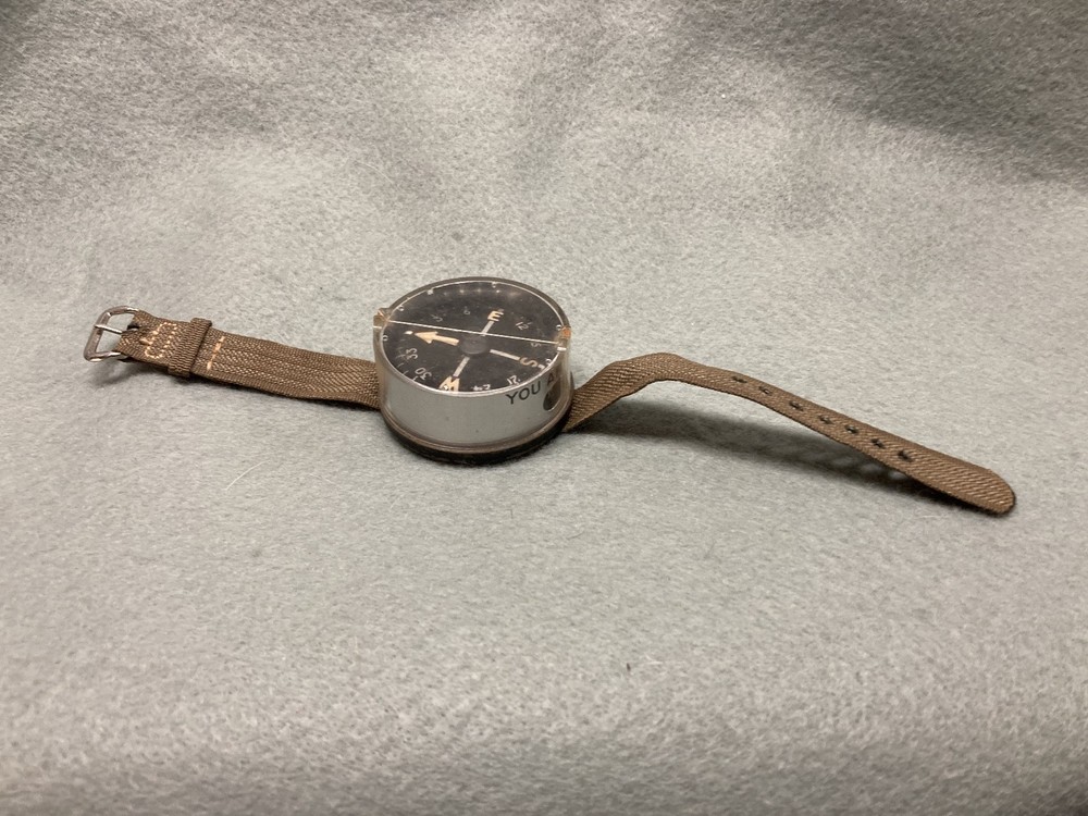 (a105)  vintage Compass on wrist strap