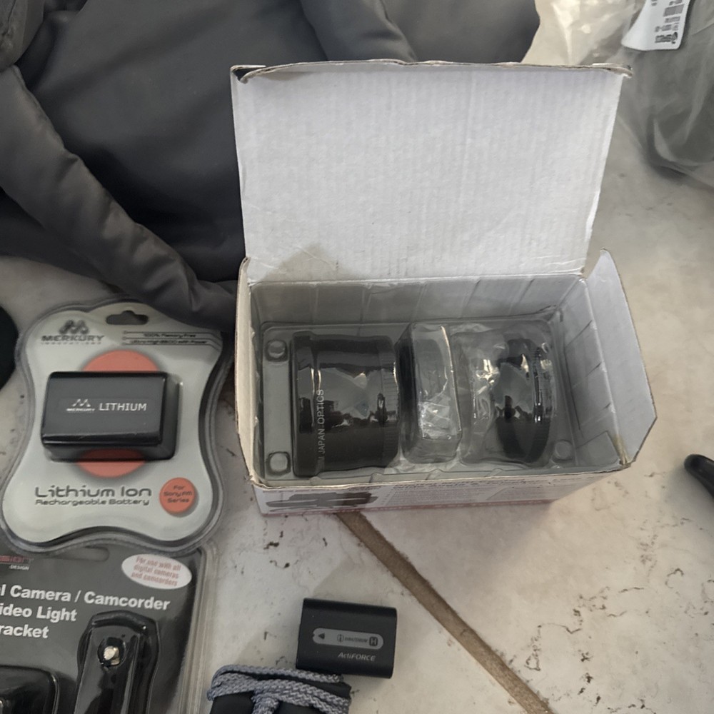 New and used camera accessories lot