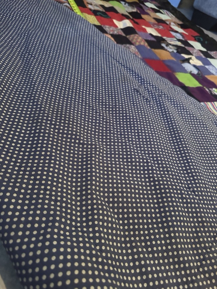 Cutters A handmade patchwork quilt with varied fabric squares