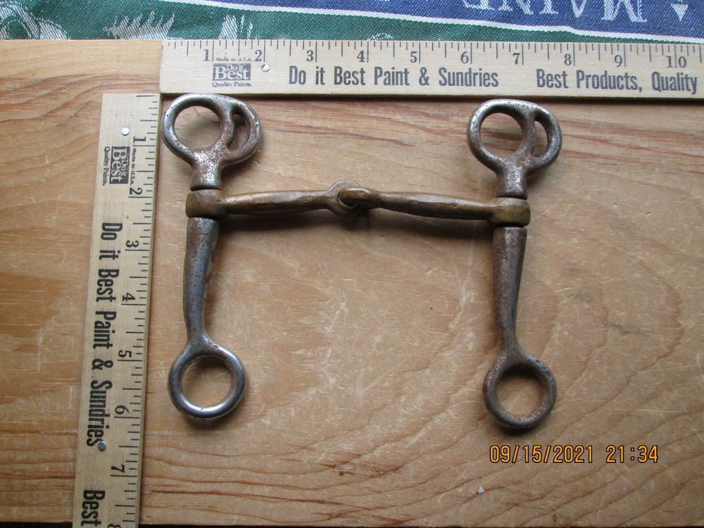 rusty iron & brass horse bit decor